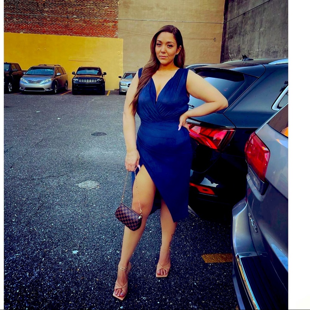 Navy blue mid length dress.
